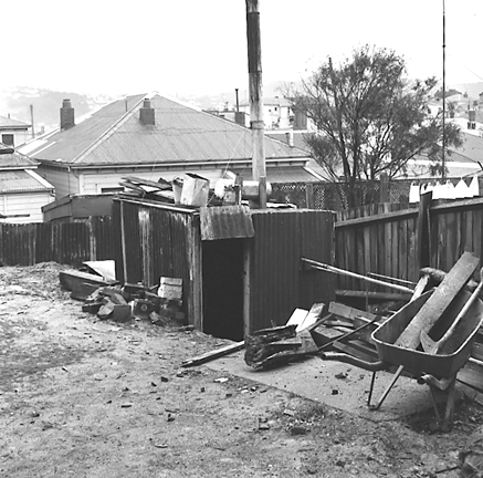 j. Interior and exterior views of a two storey wooden dwelling. Faulty plumbing and wiring