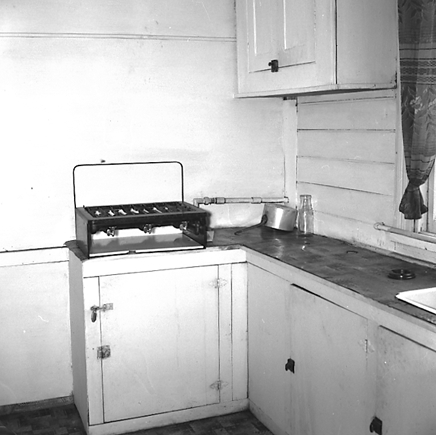 l. Interior and exterior views of a two storey wooden dwelling. Faulty plumbing and wiring