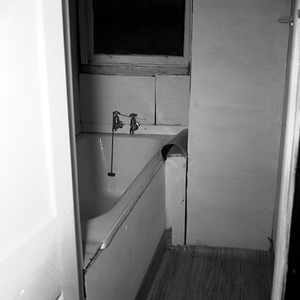 m. Interior and exterior views of a two storey wooden dwelling. Faulty plumbing and wiring