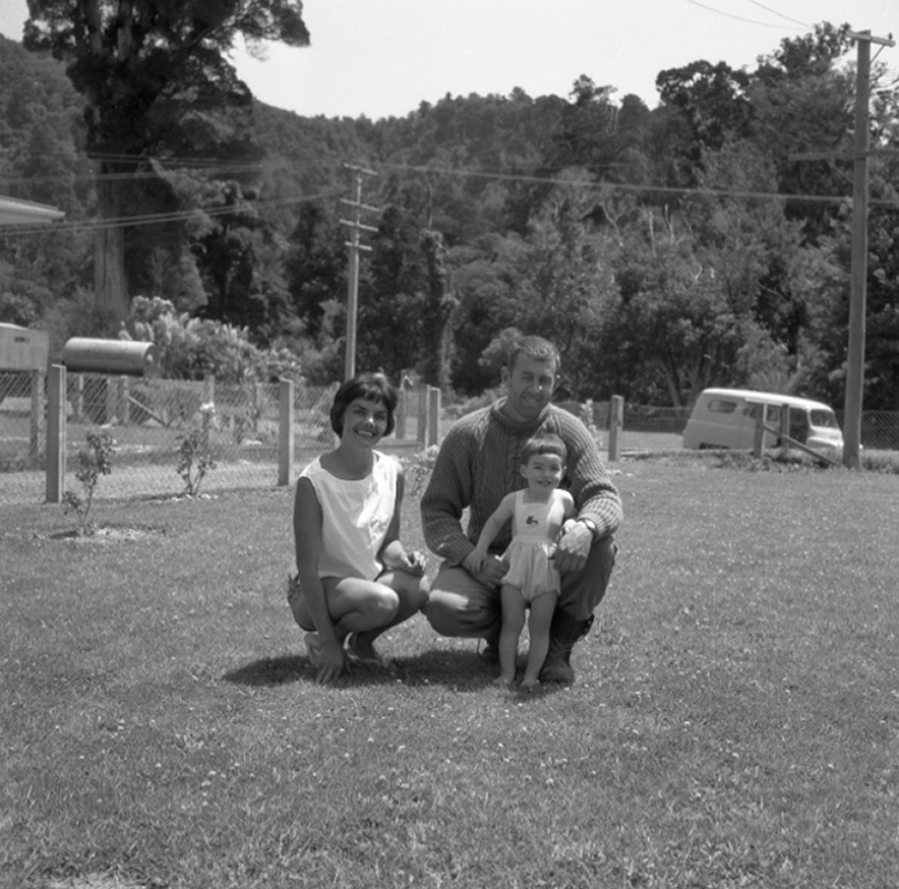 f. [Unidentified Family outdoors]