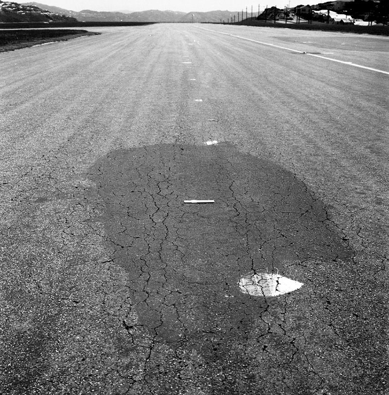 e. Airport runway surface flaws