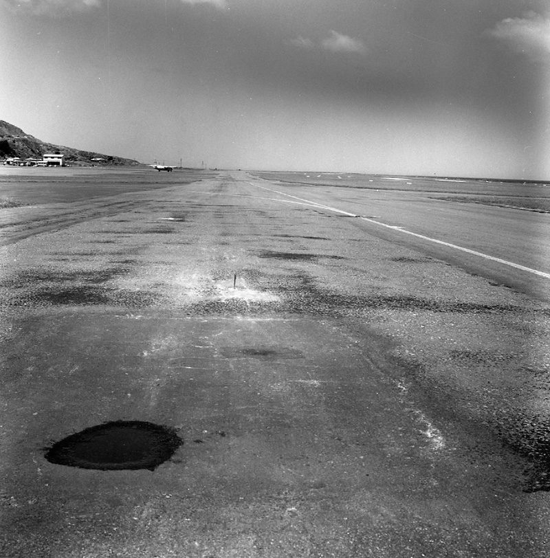g. Airport runway surface flaws