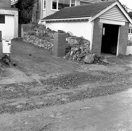 f. Single storey wooden dwellings, footpaths, motorvehicles