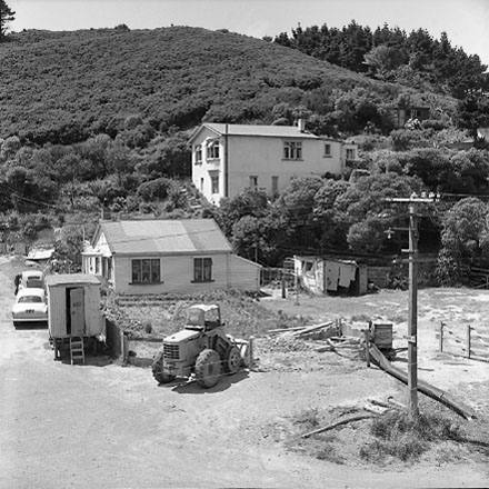 b. Interior of drainage tunnel, workman inside drainage tunnel