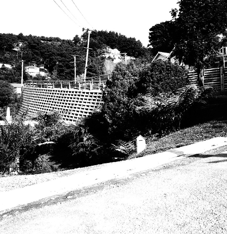 b. Mairangi Road, retaining wall