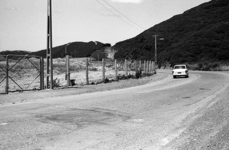 i. Looking south along Burma Road, tip on the left