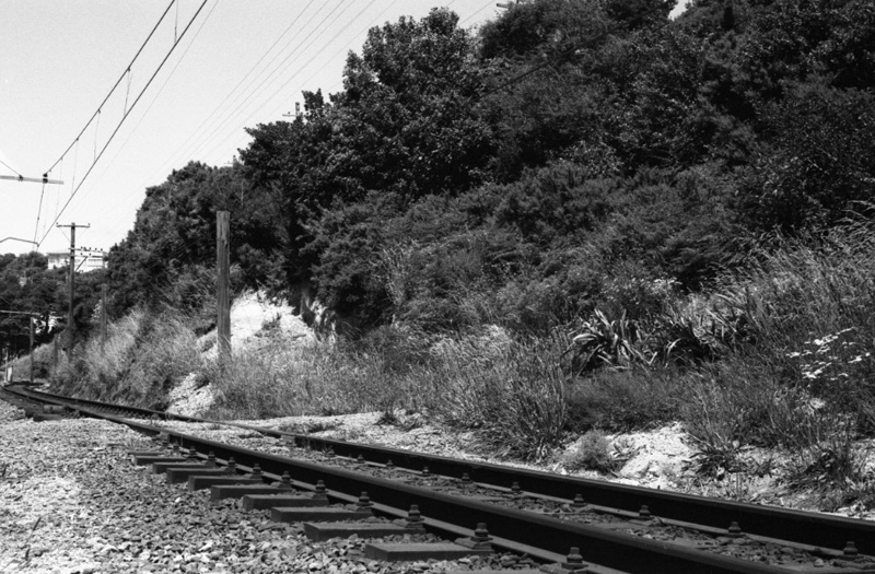 p. Railway track below Burma Road
