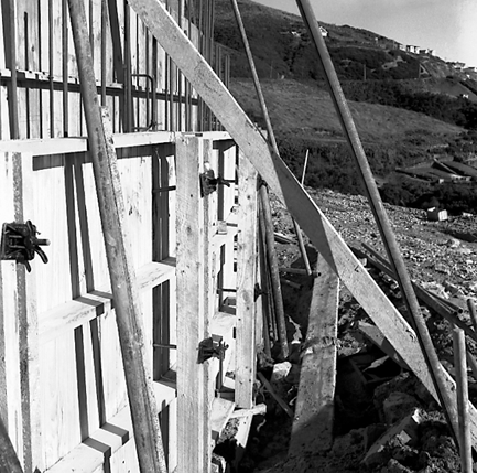 e. View of construction site, uprights have been installed