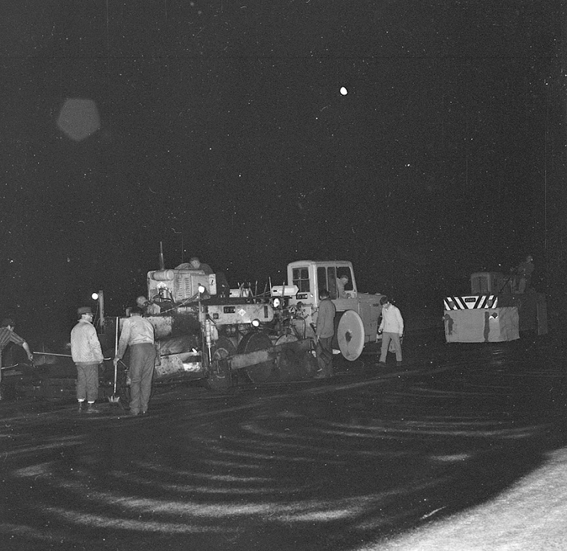 f. Airport, night paving of runway