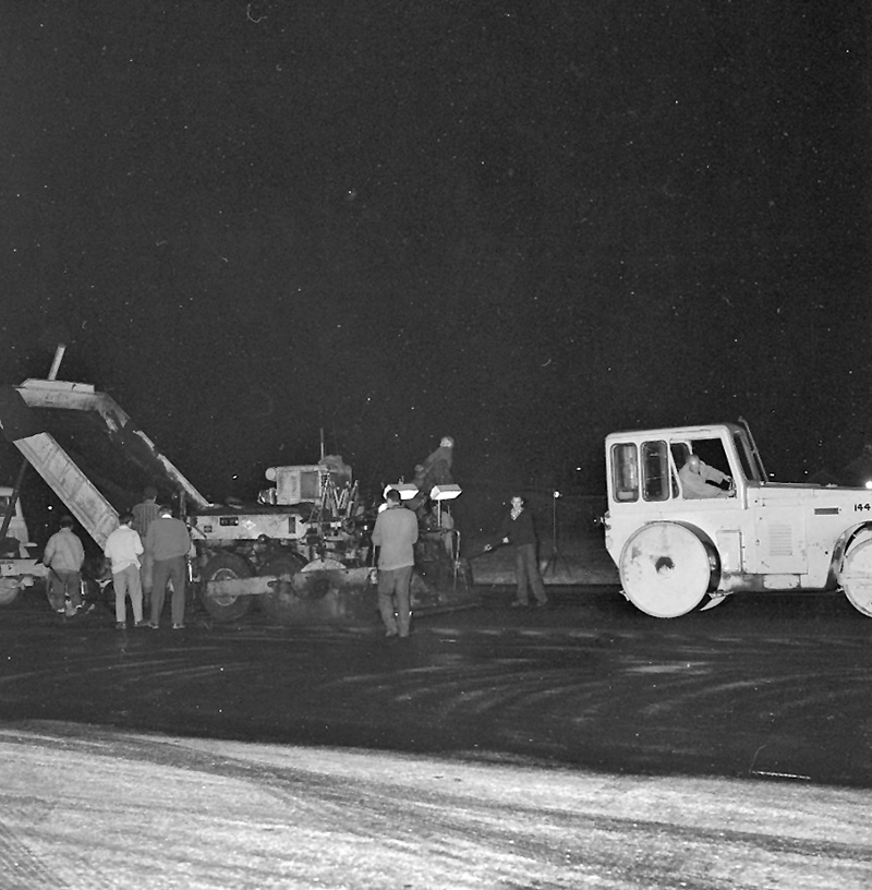 i. Airport, night paving of runway