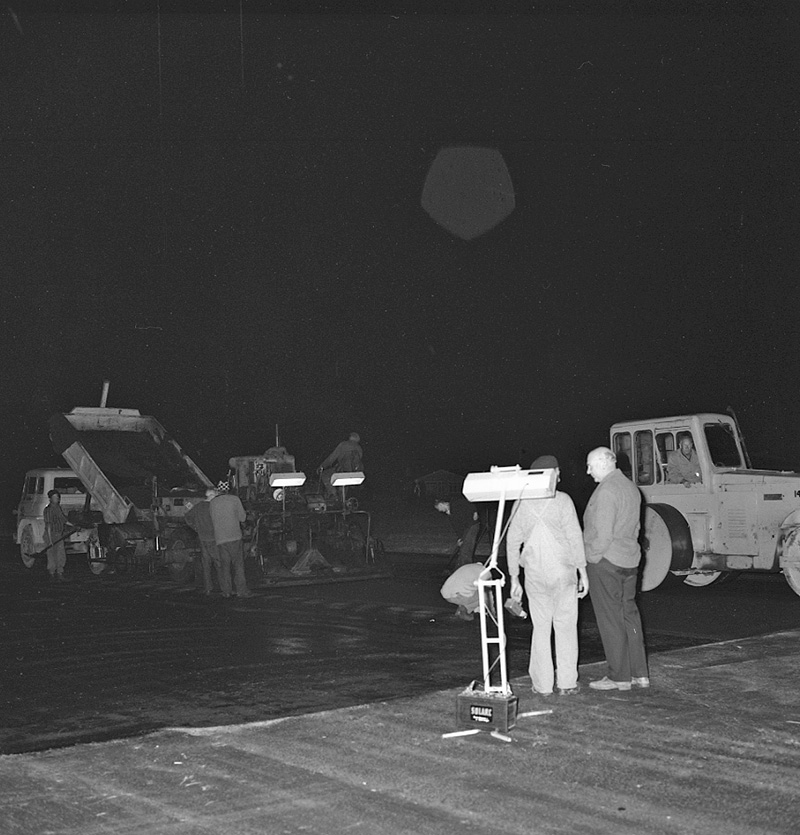 j. Airport, night paving of runway