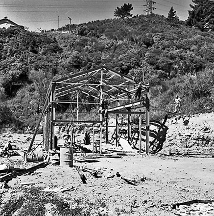 b. Workmen constructing building in Karori reservoir area