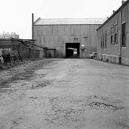 j. Interior of Tram Barns, parked tramcars, motor vehicles, tramlines