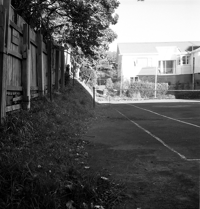 b. Tennis courts at rear of church