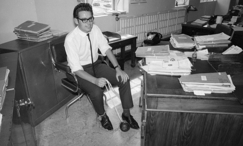 y. Ross Bly with ball and chain attached