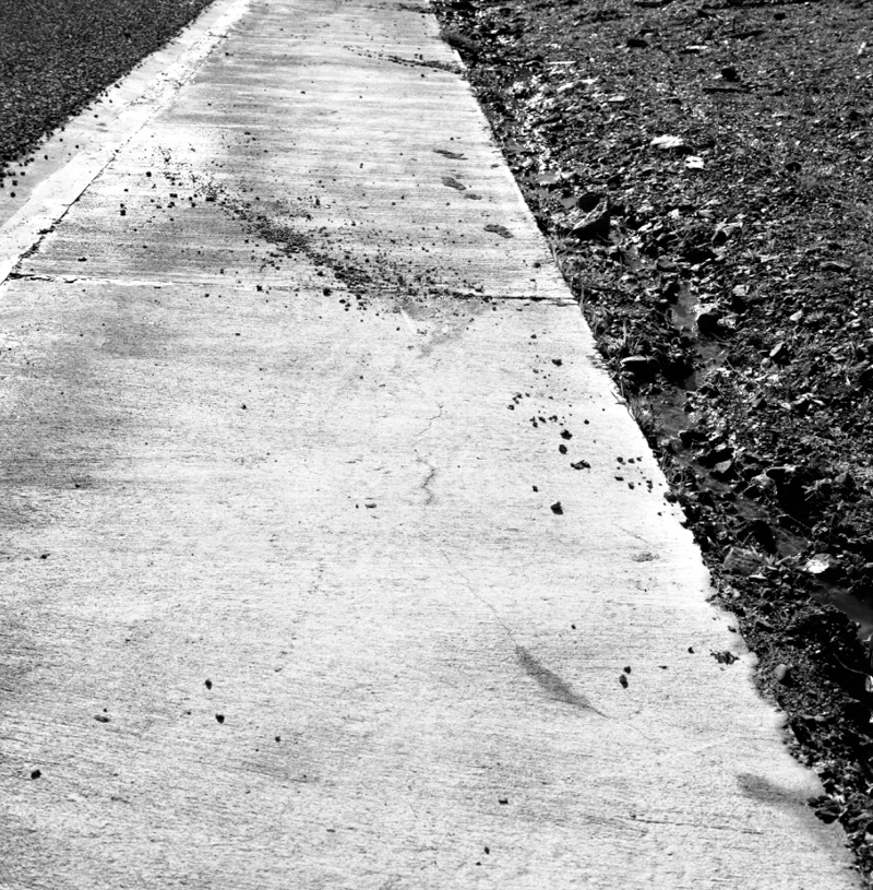 d. Cracked footpath, Woodhouse Avenue