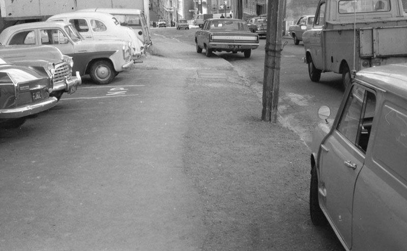 a. Footpaths - various streets. Lombard Street Parking building from Manners St