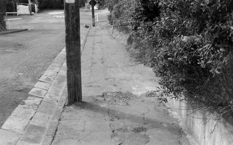 ab. Footpaths - various streets. Lombard Street Parking building from Manners St
