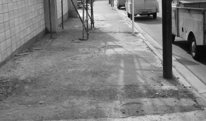 af. Footpaths - various streets. Lombard Street Parking building from Manners St