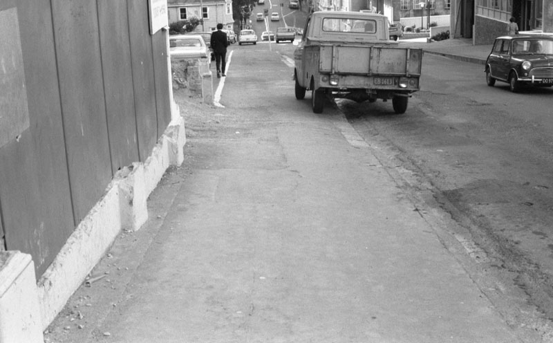 c. Footpaths - various streets. Lombard Street Parking building from Manners St