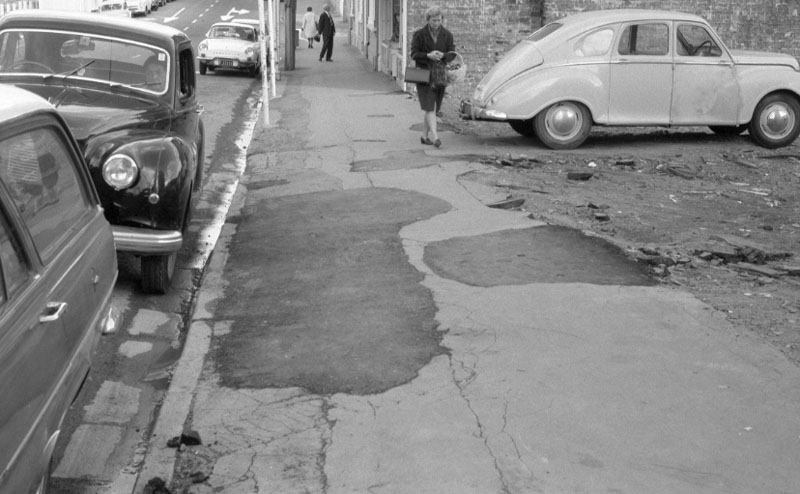 e. Footpaths - various streets. Lombard Street Parking building from Manners St