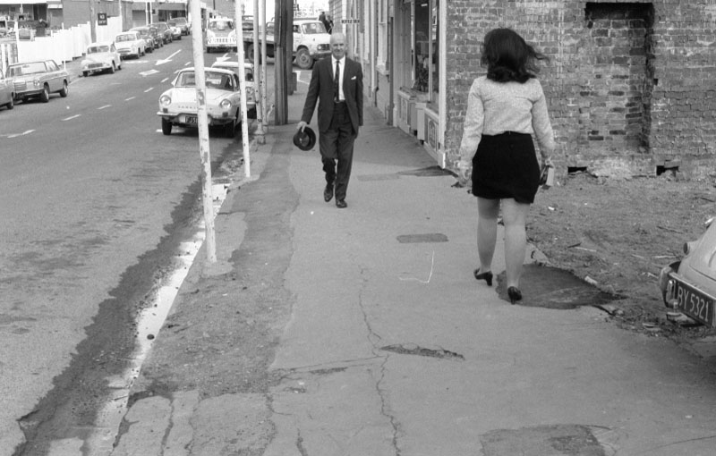 f. Footpaths - various streets. Lombard Street Parking building from Manners St