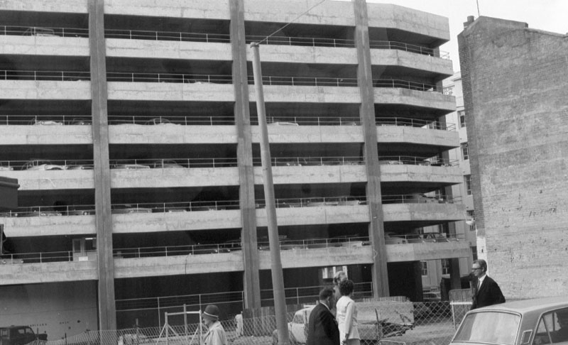 j. Footpaths - various streets. Lombard Street Parking building from Manners St