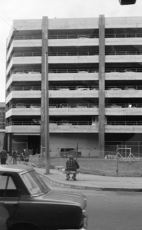 l. Footpaths - various streets. Lombard Street Parking building from Manners St