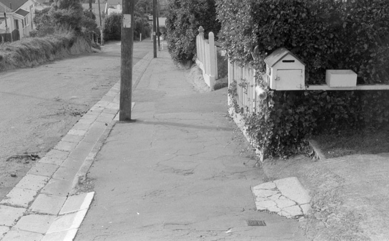 z. Footpaths - various streets. Lombard Street Parking building from Manners St