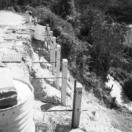 c. Views of retaining wall being constructed