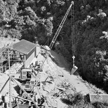 a. Karori Reservoir area, workmen installing pipes