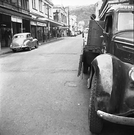 d. Views of streetscape, road surface, road works, machinery, motor vehicles, people, street signs, commercial buildings, Foresters Arms Hotel