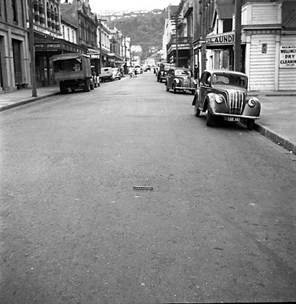 e. Views of streetscape, road surface, road works, machinery, motor vehicles, people, street signs, commercial buildings, Foresters Arms Hotel