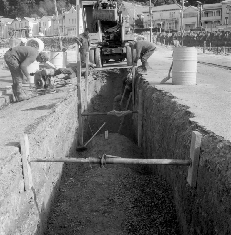b. Hawkestone St, laying 54 inch stormwater pipes