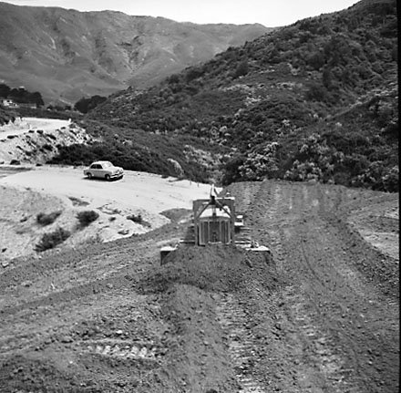 d. Views of bulldozer creating new access