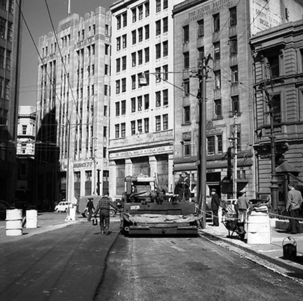 b. Road resurfacing, corner of Lambton Quay and Featherston Street