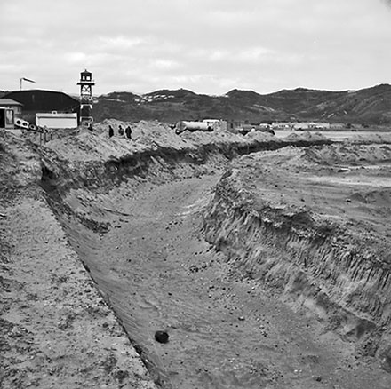 i. Airport, construction of drainage channels