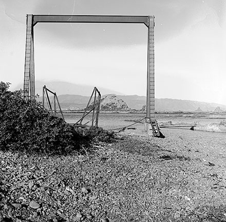 d. Views of coastline from beach, Taputeranga Island in background
