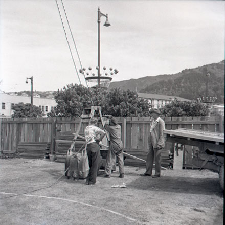 b. Views of workmen, equipment, excavating machinery