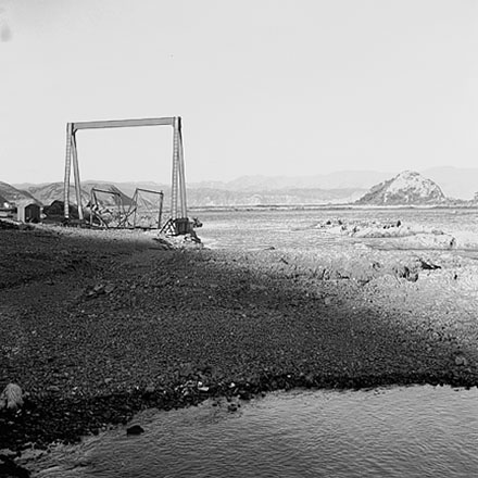 m. Views of coastline from beach, Taputeranga Island in background