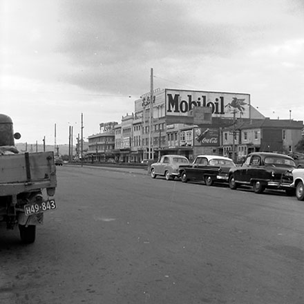d. Elevated views of the north end of Cambridge and Kent Terrace, taxi stands, Embassy Theatre, motor vehicles, billboard for 'Mobil Oil'