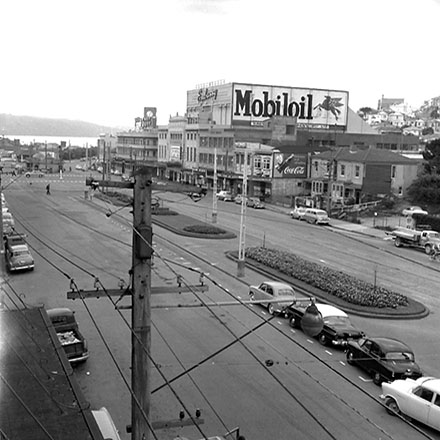 f. Elevated views of the north end of Cambridge and Kent Terrace, taxi stands, Embassy Theatre, motor vehicles, billboard for 'Mobil Oil'