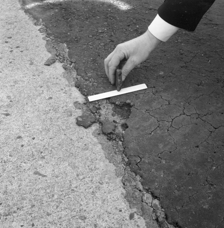 a. Wellington Airport, paving failure at feather edging by hardstanding at gates 6-7