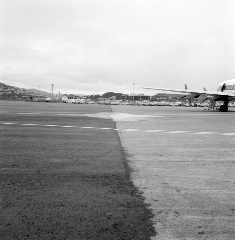 c. Wellington Airport, paving failure at feather edging by hardstanding at gates 6-7