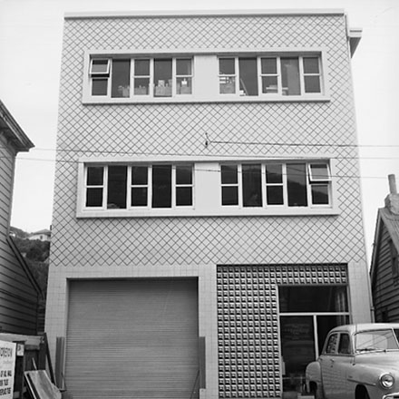 f. Views of the commercial / industrial area around the Hutt Road and Kaiwharawhara Road intersection. Warehouses, dwellings, BP Service Station, motor vehicles, Kaiwarra Wool Store, Wm Cable Ltd