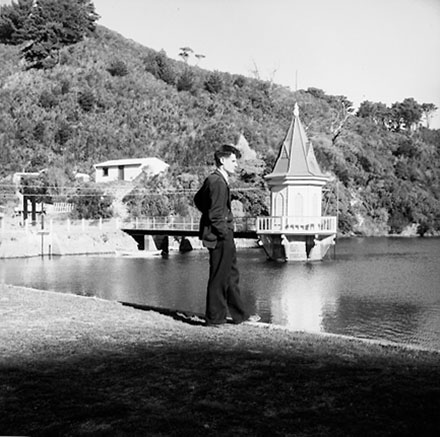 a. Man standing in foreground