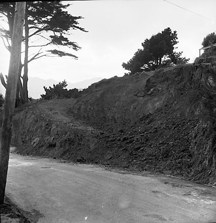 a. Collapsed bank, dwellings