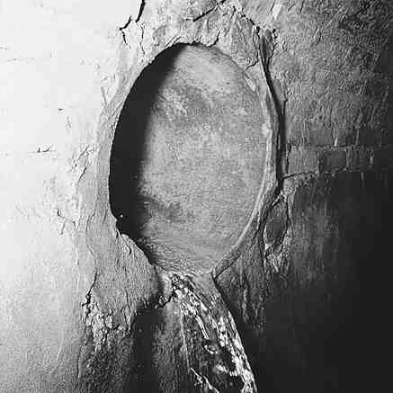 d. Workmen inspecting inside of drains