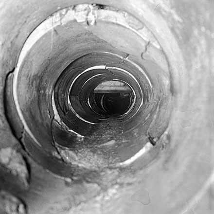h. Workmen inspecting inside of drains