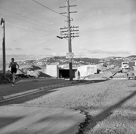 a. Interior and exterior views of a pedestrian subway that runs under the airport, from Rongotai to Miro Street and Broadway